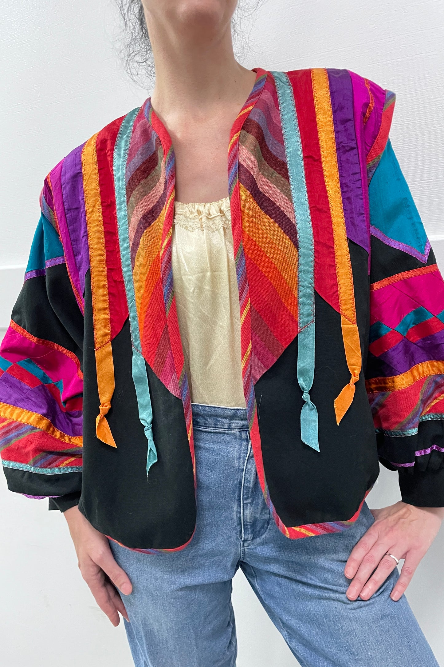 Rainbow patchwork ribbon fringe coat selected by Cannonball and Tilly