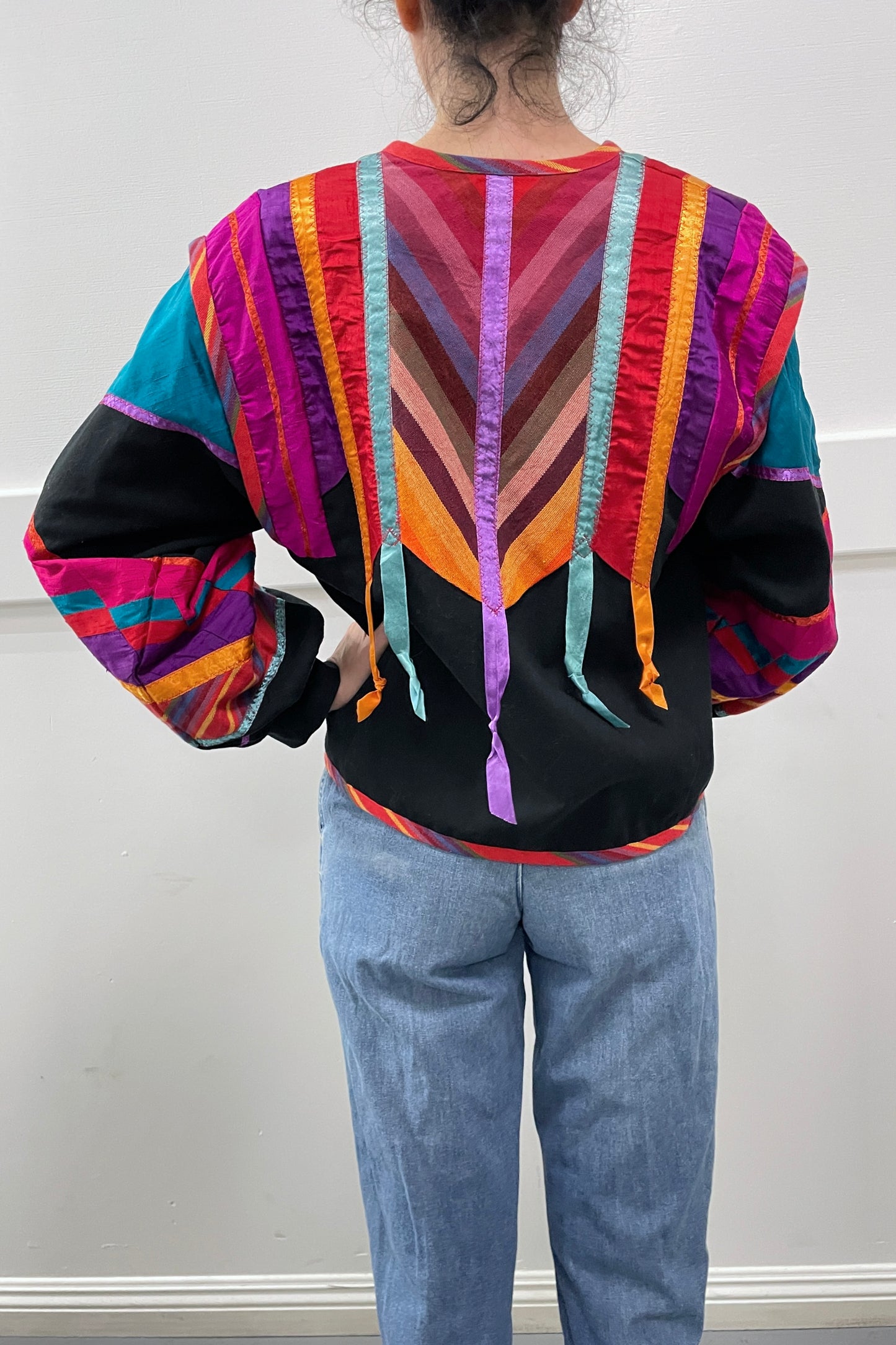 Rainbow patchwork ribbon fringe coat selected by Cannonball and Tilly