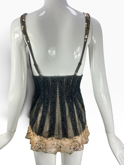 Back view of Cannonball and Tilly black lace corset bodysuit with vertical beaded panels and gold sequin hem