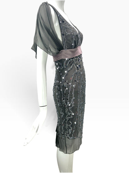 Cannonball and Tilly charcoal grey midi evening dress with intricate beadwork, sequins, and sheer draped sleeves.