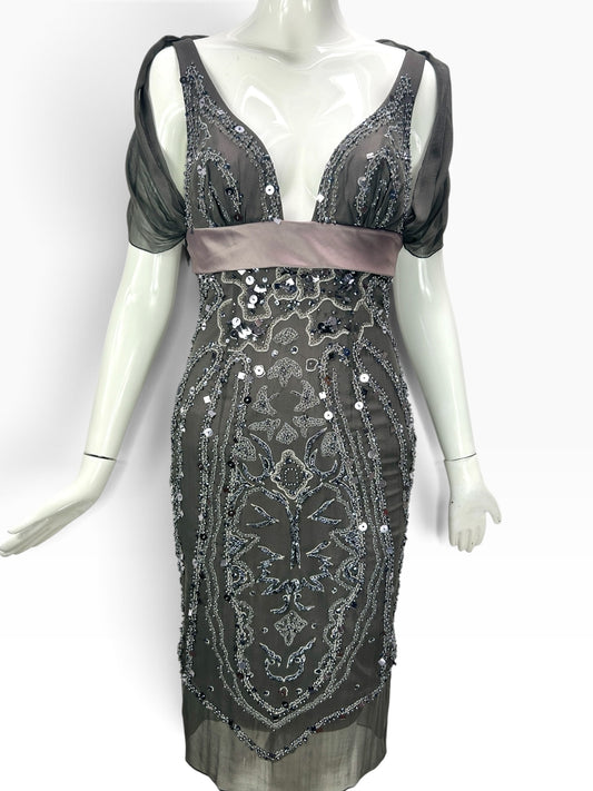 Cannonball and Tilly charcoal grey midi evening dress with intricate sequin beadwork, satin waistband, and sheer sleeves.