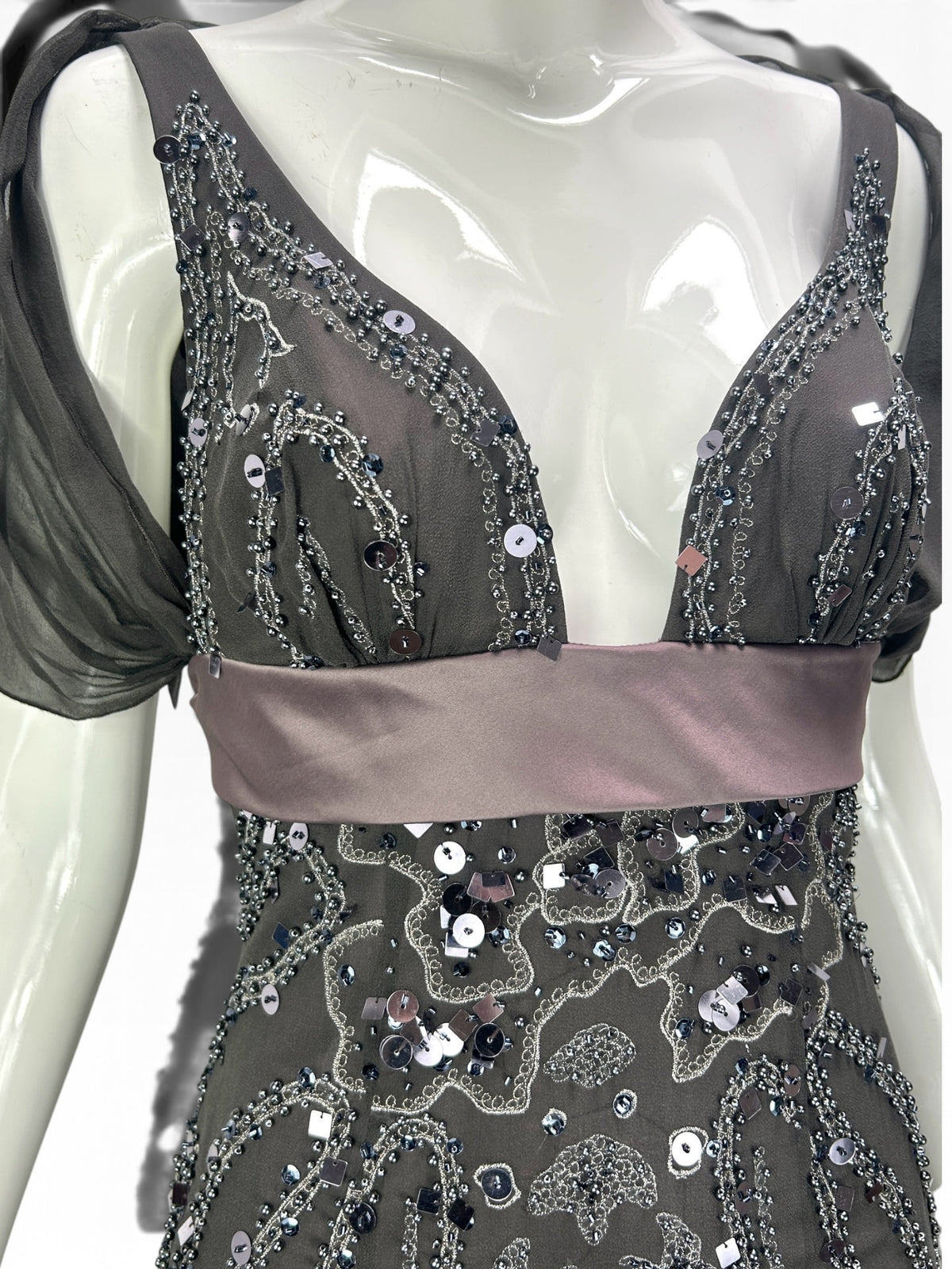 Cannonball and Tilly charcoal grey formal evening dress with intricate beadwork, sequins, and a satin waistband.