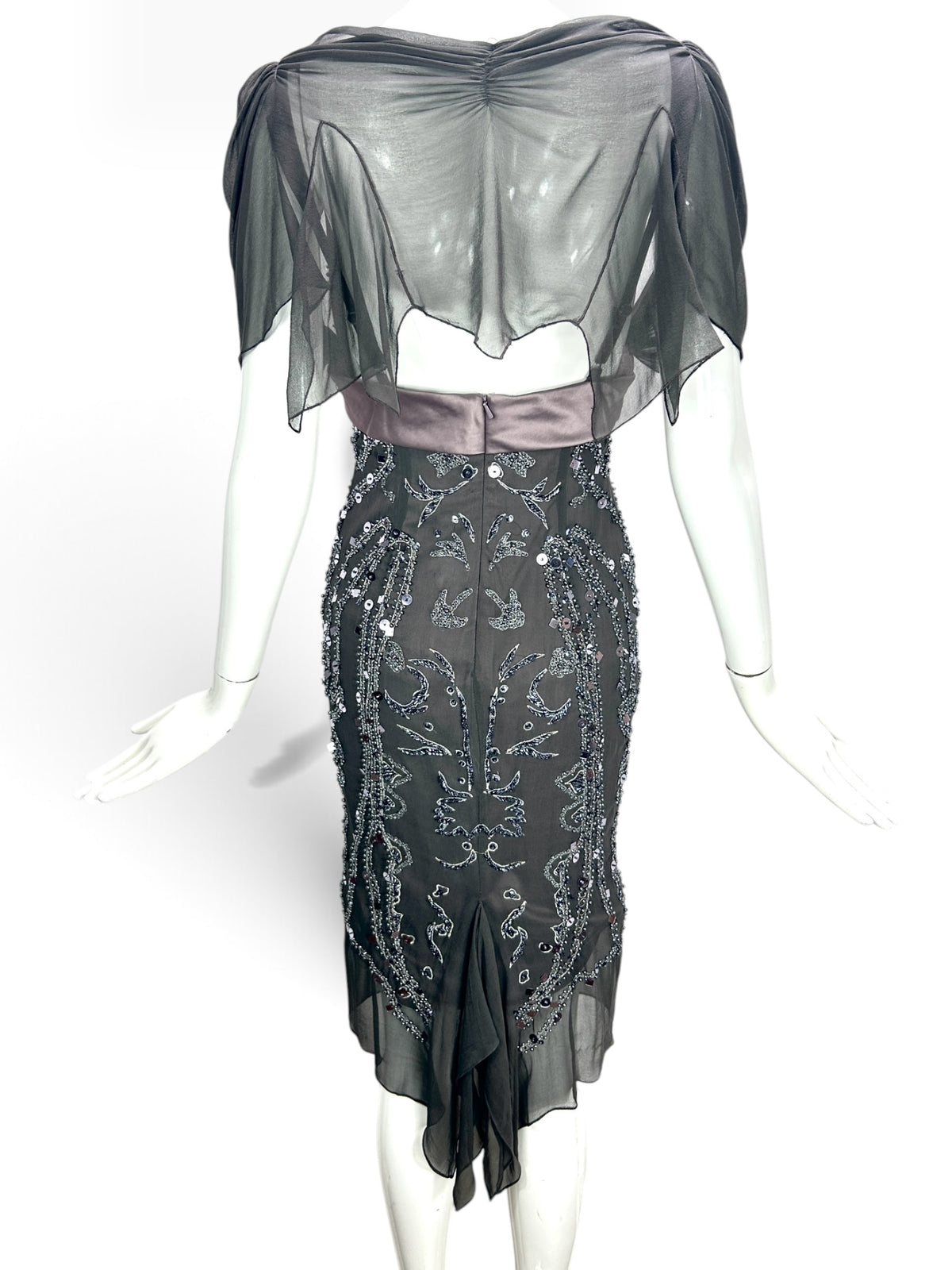 Back view of a Cannonball and Tilly charcoal grey midi evening dress with sequin embellishments and sheer draped sleeves