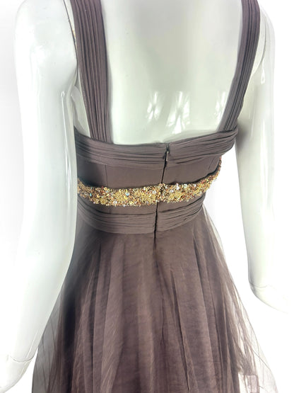 Cannonball and Tilly chocolate brown sleeveless evening dress with gold and bronze beaded waist detail on a mannequin