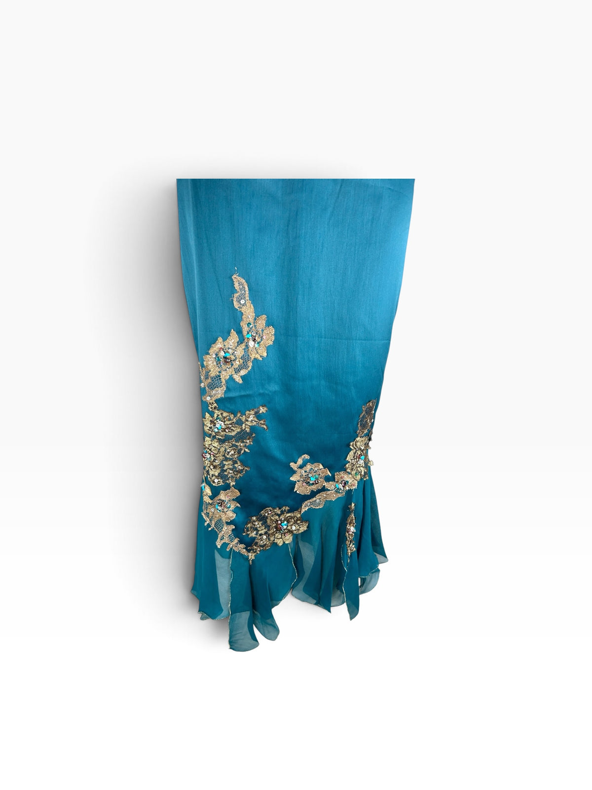 Cannonball and Tilly teal mermaid formal skirt with gold floral embroidery, sequins, and a ruffled hemline.
