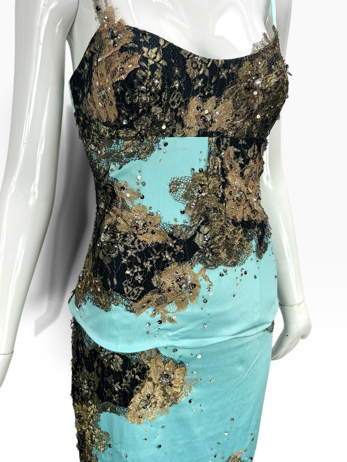 Cannonball and Tilly turquoise mermaid evening dress with black and gold sequined lace overlay and sweetheart neckline